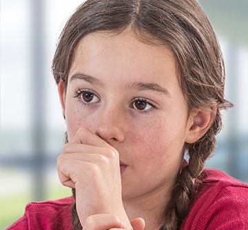 Girl sucking her thumb