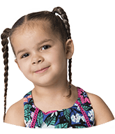 Little girl smiling after receiving dentistry for children