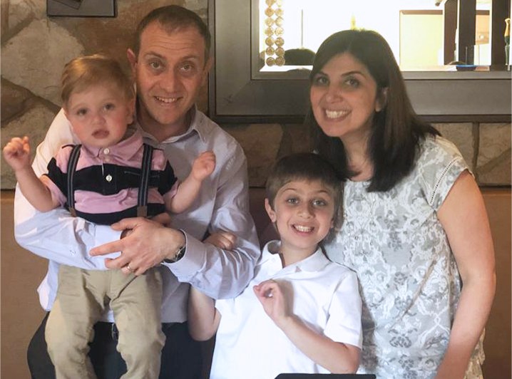 Doctor Boulos and his family smiling together