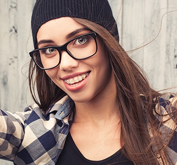 Teen with tooth-colored braces