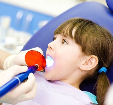 Little girl getting dental sealants for kids in Pelham