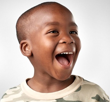 Smiling little boy with dental sealants for kids in Pelham