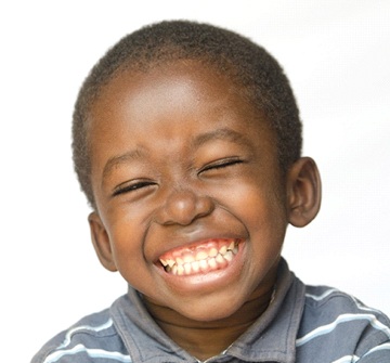 Smiling boy after solea laser dentistry treatment