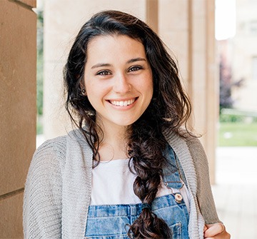 Teen girl smiling at school