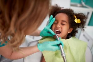 Little girl visiting her Nashua pediatric dentist