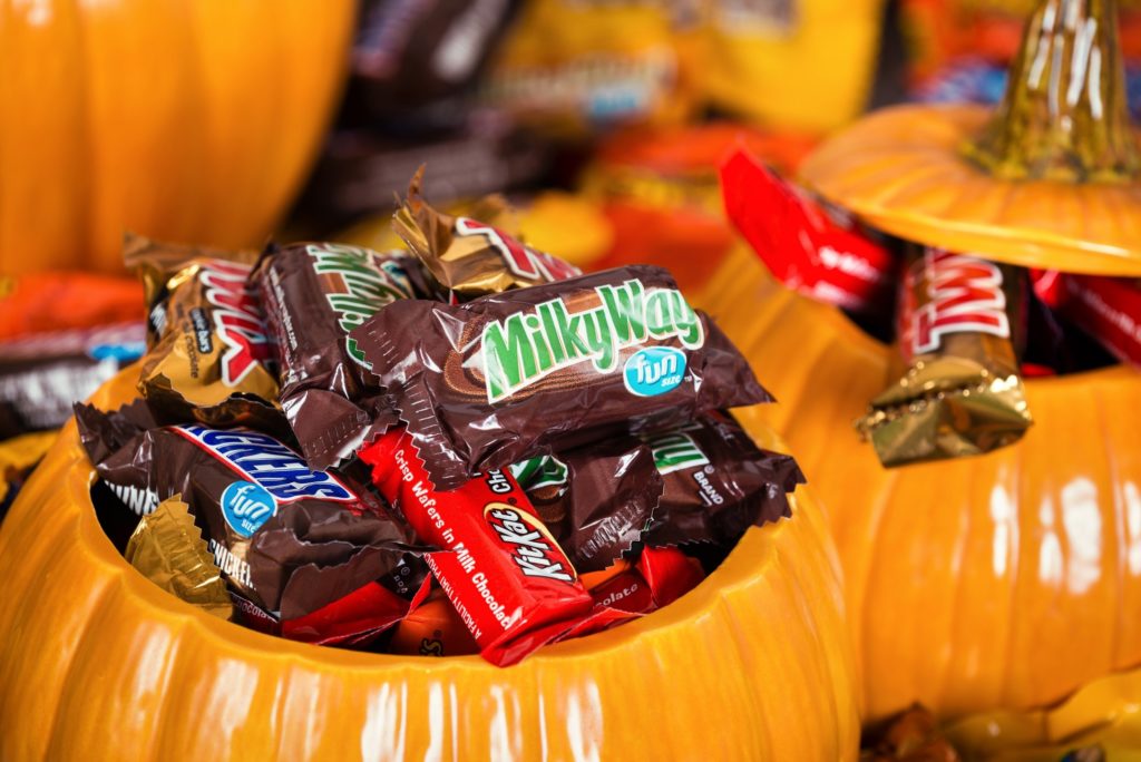 Glass pumpkin filled to the brim with candy